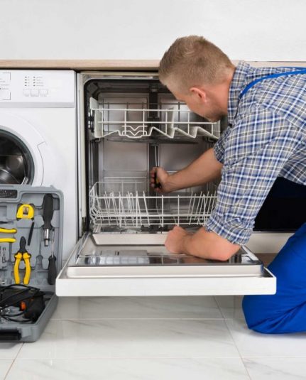 technician fixing a dishwasher repair scranton